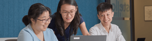 An Analyst based in Singapore looking at a laptop screen
